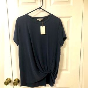 Women’s Green Envelope Large short sleeve, navy blue shirt.